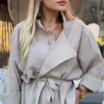 Light beige wrap-style blouse