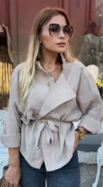 Light beige wrap-style blouse