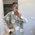 White oversized shirt with grey knit vest