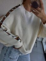 Cream knit sweater with lace-up metallic sleeve details - Image 2