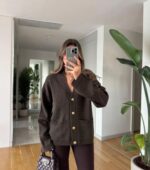 Brown cardigan with gold buttons and front pockets