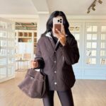 Brown quilted jacket with a white lined-hood