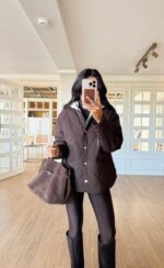 Brown quilted jacket with a white lined-hood