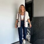 Cream knit cardigan with striped trim and front pockets