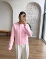 Pink knit cardigan with cable details