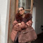 Brown puffer jacket with fur collar