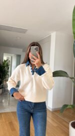 Off white knit sweater with denim collar and cuffs