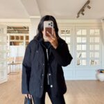 Black quilted jacket with a black lined-hood