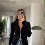 Black ribbed zip-up collared top