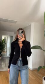 Black ribbed zip-up collared top