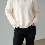 Cream zip neck sweater with floral embroidery