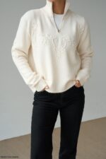 Cream zip neck sweater with floral embroidery