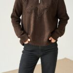 Brown zip neck sweater with floral embroidery