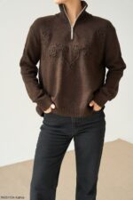 Brown zip neck sweater with floral embroidery
