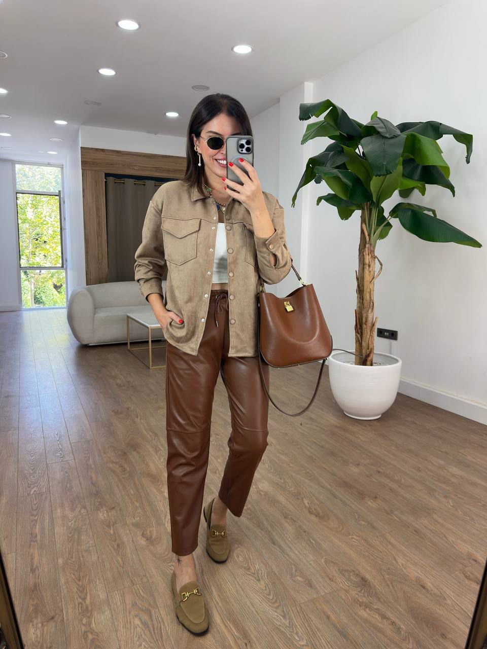 a40d8a19-b9cb-4397-abc3-c4b9176d52ef Brown leather crop pants - Image 1