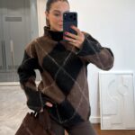 Brown and black argyle sweater