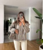 Greige cardigan with gold buttons and front pockets