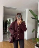 Burgundy cardigan with gold buttons and front pockets