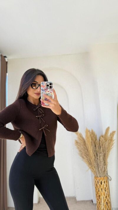 Brown knit cardigan with beaded bow closures