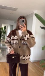 oversized cardigan with geometric patterns in warm brown tones