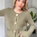 Green cardigan with gold buttons