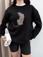 Oversized black sweatshirt with leopard cat print - Image 2