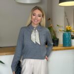 Grey top with patterned neck scarf