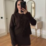 Brown knit cardigan with beaded bow buttons