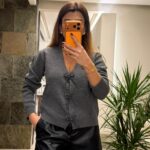 Grey sweater with beaded bow buttons