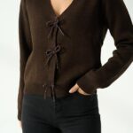 Brown top with beaded bow buttons