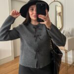 Grey knit cardigan with beaded bow buttons