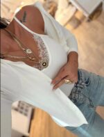 White top with matching cardigan
