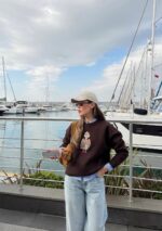 Brown embroidered character crewneck sweater