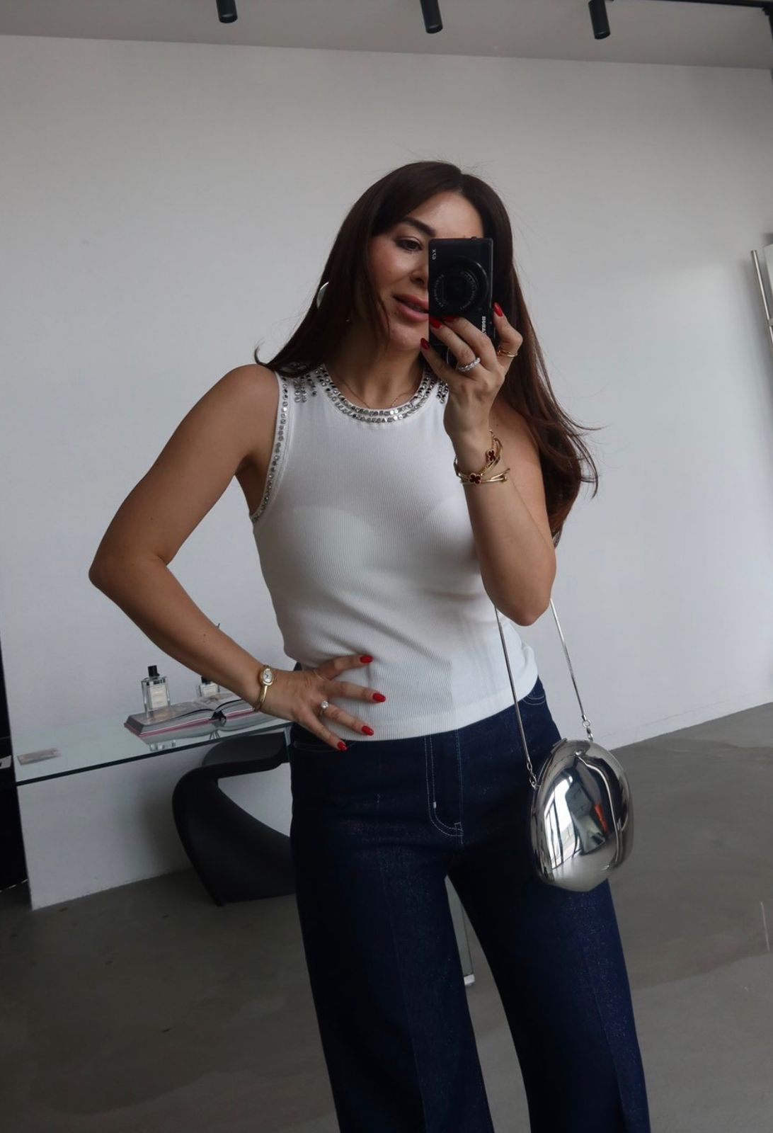 c0fd8be3-ed50-4dc5-baa9-324e371bdf05 White Sleeveless Top With Rhinestone Trim - Image 1