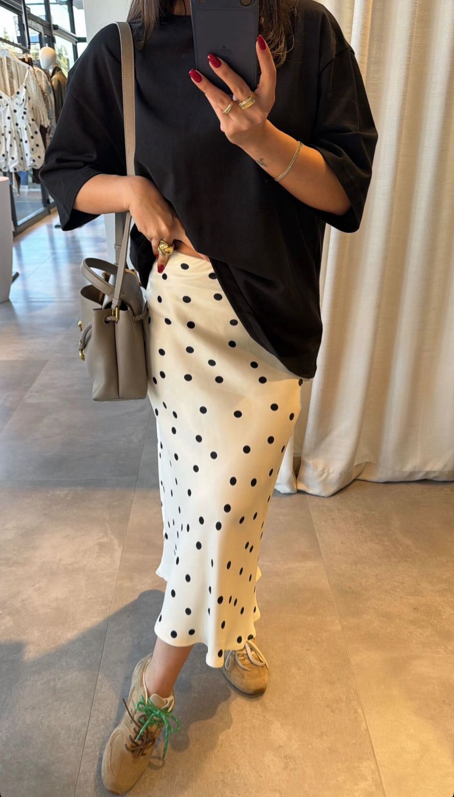1dae23de-a334-473e-8563-4ceeb6bcb0e3 White Polka Dot Midi Skirt - Image 1