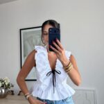 White Ruffle Sleeveless Peplum Blouse