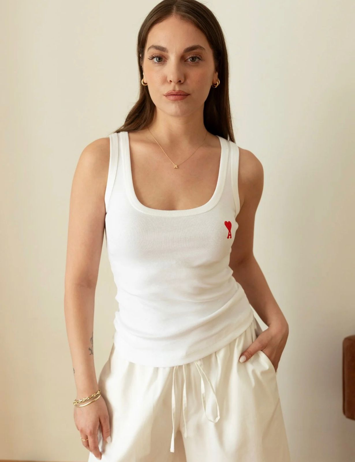 fccf60ef-29c2-4d5c-a6ee-d6e7fc6c03ab White Sleeveless Tank Top With Red Heart - Image 1