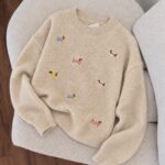 Beige Sweater With Embroidered Dog Pattern